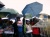 Federal Workers Rally in the Rain to Demand House Vote on Reopening Government